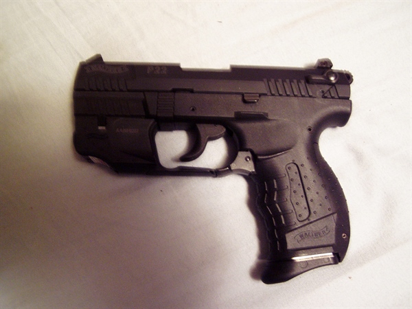 WALTHER P22 ,FACTORY RED DOT LASER SIGHT ,  HAS BARREL THREAD SUPPERSOR ADOPTER INCLUDED HAS UN FILLED OUT WARRANTY CARD