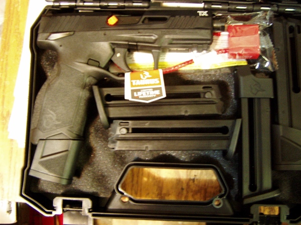 TAURUS TX22 PISTOL (3) 16 RD + (2) 22 RD MAGAZINES  $ 350.00
