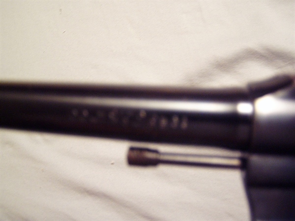 Used Colt Official Police fitted with a 6" barrel, round fixed front sight with brass or gold insert, fixed rear sight $ 750.00