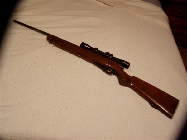 USED ( LET PICTURE DECIDE CONDITION ) WESTERN FIELD 24M  WAS MADE BY MOSSBERG  MODEL 51 WITH A 4X32  TASCO SCOPE 22LR SEMI-AUTO LOADS THRU STOCK ON RIGHT SIDE  The Mossberg Model 51 is a .22 caliber r