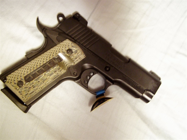 EAA OFFICER 45 1911$ 575.00